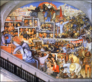 A photograph of a gigantic wall-size mural depicting various scenes representing Mexican history.
