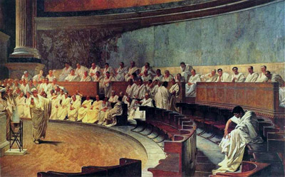 A painting shows a gallery of toga-wearing men watching the speech of one standing before them.