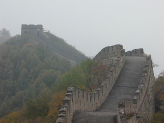Photo of the Great Wall on mountains.