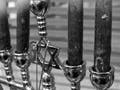 Black and white close-up photo of a menorah, the Star of David in its center.