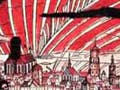 A black and white print with red tinting of people on a hill over-looking a city with aurora above it.