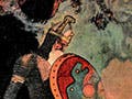 A man carrying a sword and a shield of armor stands upon a rock, near a reptile with smoke coming out of its nose. 
