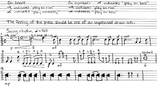 Excerpt of percussion solo score, including notation for various instruments and techniques.