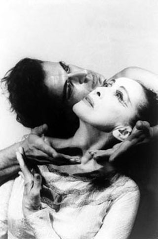 Portrait of Martha Graham and Bertram Ross, faces touching, in 'Visionary recital', June 27, 1961.