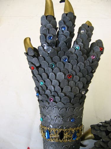 Up close, the rhinestones are glued to individual scales.