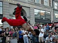 Photo of a man break dancing.