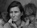 A black and white photograph of a woman with two small children leaning on her shoulder. The woman in this 1931 iconic Depression-era photograph is Florence Christie Owens.