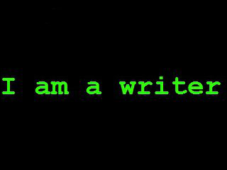 An image of green text on a black background reading "I am a writer."