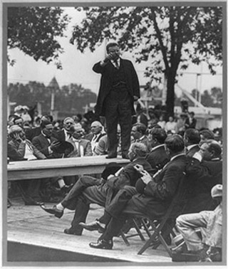 Theodore Roosevelt making a speech.