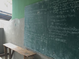 Chalkboard at a school in Haiti with lessons written on it