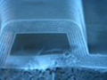 Microscope photo of end view of a multi-layered waveguide.