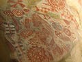 Cave painting with intricate geometric patterns.