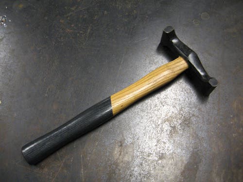 Photo of a double-peen hammer.