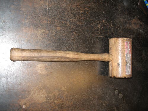 Photo of a wooden mallet.