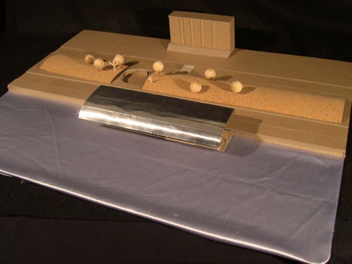 A site model showing the placement of the project along the river.
