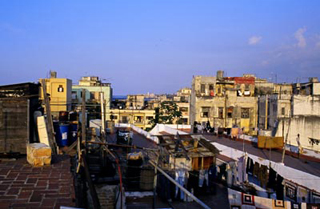 A photo of the rooftops of Havana, Cuba with lots of clotheslines visible.