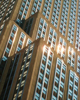 Photograph of sunlight reflecting off a high-rise building.