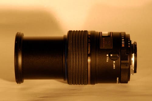 Camera lens in macro mode (full extension).
