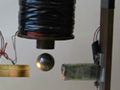 Photograph of magnetic levitation demonstration.