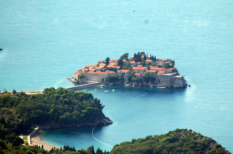 A cluster of old houses on a tombolo.