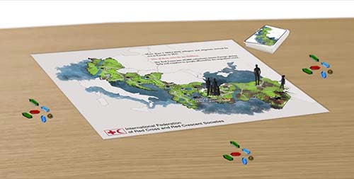 Image of game, cards and pieces on a tabletop.