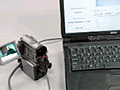 The FBI's digital video authenticator with camcorder.