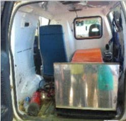 Photo of an ambulance interior with no visible medical supplies.