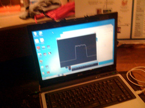 A photo showing a response curve displayed on the computer screen during testing.
