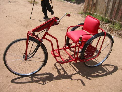 Photo of trike on a dirt road.