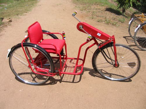Photo of trike on a dirt road.