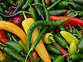 A basket of assorted chili peppers.