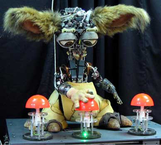 Photo of Leo, a robot with big, furry ears.