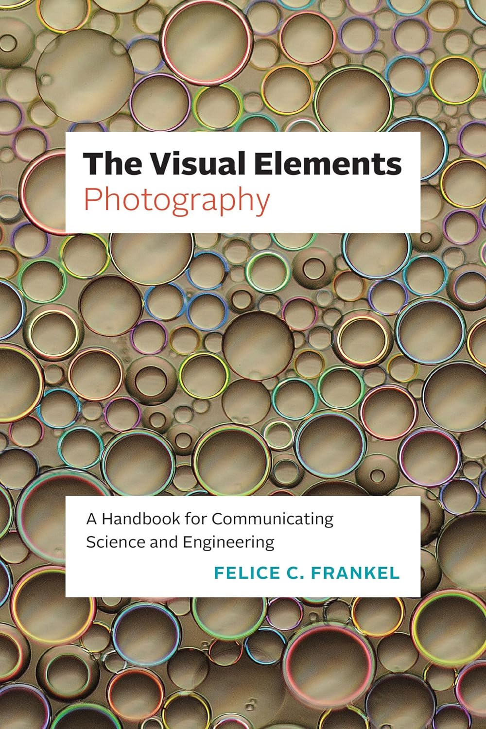 The cover of the book The Visual Elements-Photography. The background is a tan color, which rings of varying sizes and colors laid on top. 