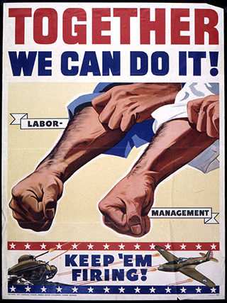 Close-up of two strong men’s forearms with hands clenched into fists representing Labor and Management.