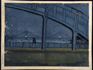 A scene of a bridge at night