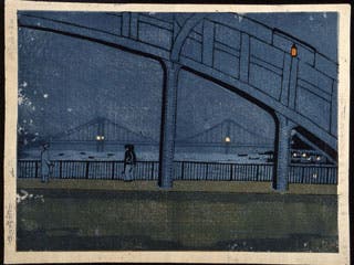 A scene of a bridge at night