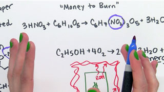 Jessica Harrop describes the chemistry involved in the "Money to Burn" demonstration.