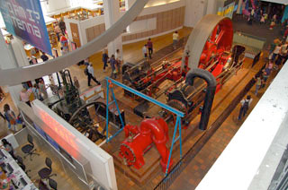 An image of a 1903 Burnley Ironworks Company, Stationary Engine, a corliss steam engine, on display at the London Museum of Science.