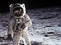 Photo of an astronaut on the surface of the moon.