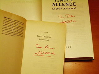 Isabel Allende's autograph on two of her books
